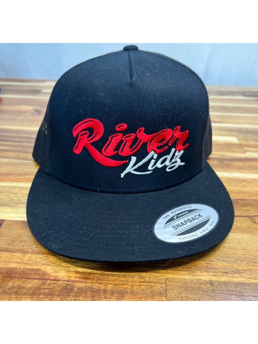 River Kidz black hat with red/ white lettering, trucker hat, snapback, 5 panel